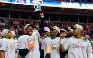 MVP Von Miller raises Most Valuable Player trophy high. 