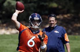 Competition in Denver training camp for QB.