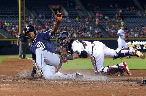 Braves and Padres play at the plate