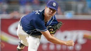 Padres' pitcher Cal Quandrille throwing.